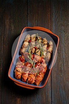 Traditional Christmas dish Sausages wrapped in bacon