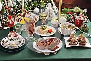 Traditional Christmas Eve dishes on festive table