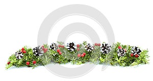 A traditional Christmas garland of snowy fir branches with cones and red berries on a white background. Copy space