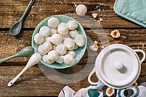 Traditional Christmas snowballs cookies, biscuits covered sugar powder . Top view