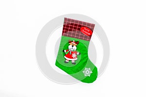 Traditional christmas stocking on white background top view copy space