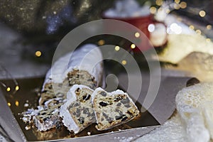 Traditional Christmas stollen, Christstollen - classic Christmas yeast bread. Hot beverage with marshmallow. Cozy