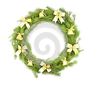 Traditional Christmas wreath with golden bows and bells isolated on a white background. Christmas holiday.