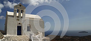 Traditional church in Greece with a bell. panorama