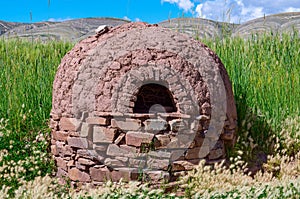 Traditional clay oven in the village. Bolivia photo