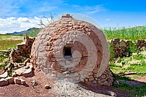 Traditional clay oven in the village of Bolivia photo