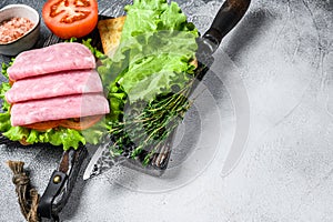 Traditional club sandwiches with turkey ham, cheese, tomatoes and lettuce. White background. Top view. Copy space