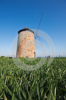 Traditional coastal windmill in Scotland