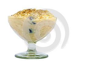 Traditional Colombian dessert made of rice and milk called arroz de leche isolated photo