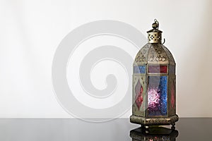 Traditional colored Lantern on dark glass