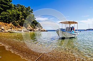 Traditional colorful boats in old town of Skiathos island, Sporades, Greece photo