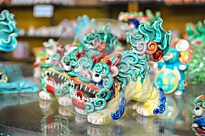 Traditional colorful chinese dragon clay figurines