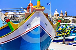 Traditional colorful fishing boats luzzu un Malta