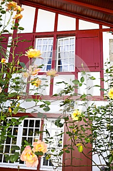 Traditional and colorful half-timbered houses with garden in Ainhoa