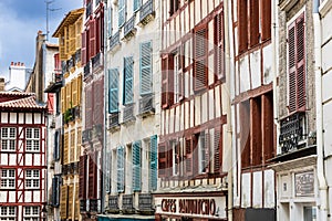 Traditional colorful half-timbered houses in the old center. Bayonne, France