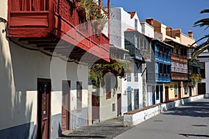 Traditional and colorful houses with wooden balconies located along Maritima avenue in Santa Cruz de la Palma