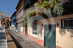 Traditional and colorful houses with wooden balconies located along Maritima avenue in Santa Cruz de la Palma