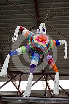 Traditional colorful pinata star shape from mexico.