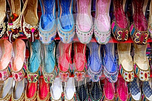 Traditional and colorful plat shoes in old souk dubai