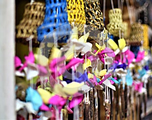 Traditional colorful rattan and sea shell wind chimes