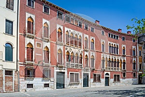 Traditional colorful red buildings of Venice