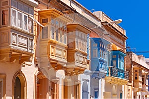Traditional colorful wooden balconies, Malta