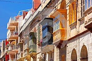 Traditional colorful wooden balconies, Malta