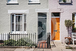 Traditional colourful bright doors on houses in Barnes, London,