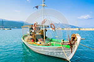Traditional colourful Greek fishing boat in port of Sami village, Kefalonia island, Greece