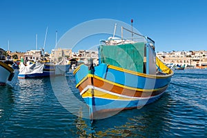 Traditional Maltese fishing boat - Luzzu photo