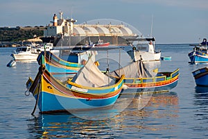 Traditional Maltese fishing boats - Luzzu photo