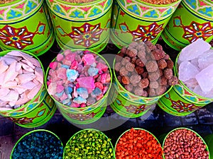 Traditional colourful spiecies in a typical exotic moroccan suk market photo