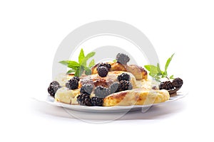 Traditional cottage cheese pancakes with pine cone jam on a white background