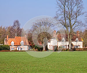 Traditional Cottages by an English Village Green