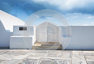 Traditional courtyard entrance in the village of Oia, Santorini, Greece. Traditional architecture.