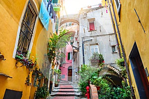 Traditional cozy street in city San Remo, Italy photo