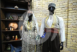 Traditional Crimean Tartar male and female dresses put on dummies