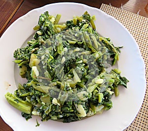 Traditional Croatian dish of Chard and potatoes on a white plate
