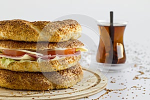 Traditional,Crunchy Turkish Bagel,Simit Sandwich with tea on wwhite