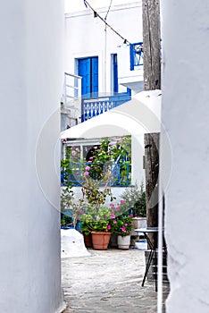 A traditional Cycladic street in Plaka, Milos island, Greece.