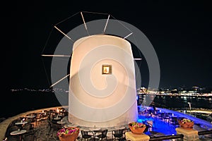 Traditional cycladic windmill at night in Parikia on the island of Paros, Cyclades