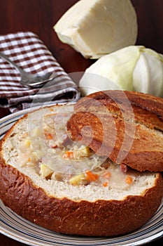 Traditional Czech cabbage soup in a bread bowl
