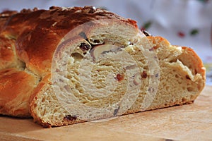 Traditional Czech Christmas cake with candles in the background