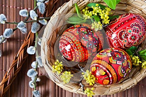 Traditional Czech easter decoration - colorful painted eggs in w