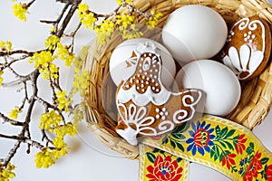 Traditional Czech easter decoration - white eggs in wicker nest