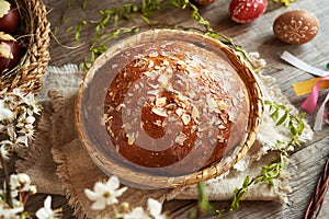 Traditional Czech sweet Easter cake called mazanec, with decorated Easter eggs