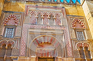 Traditional decorations of Puerta del Baptisterio gate, Mezquita, Cordoba, Spain photo