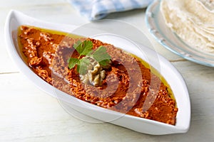 Traditional delicious Turkish appetizer, Muhammara, healthy walnut and roasted red bell pepper dip