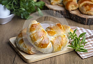 Traditional delicious Turkish food cheese croissant pastry - Turkish name pamuk pogaca, serit pogaca photo