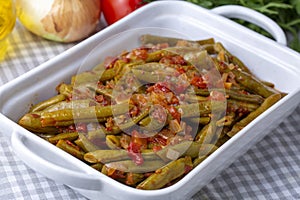 Traditional delicious Turkish food; Green beans with olive oil; Turkish name; Zeytinyagli taze fasulye photo